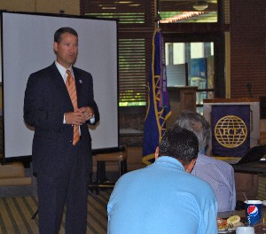Bill Marion, chief technical officer of the U.S. Air Force Air Combat Command and president of the Tidewater Chapter, addresses the chapter in September.